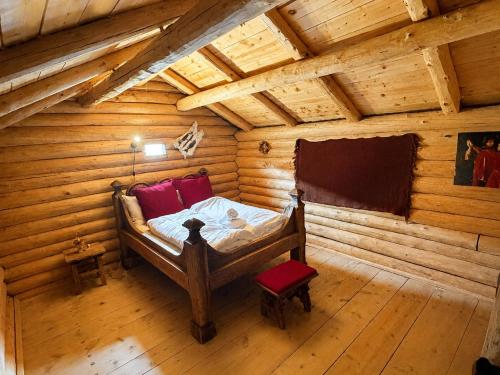an overhead view of a bedroom in a log cabin at Jørundgard Vikingcamp in Sel