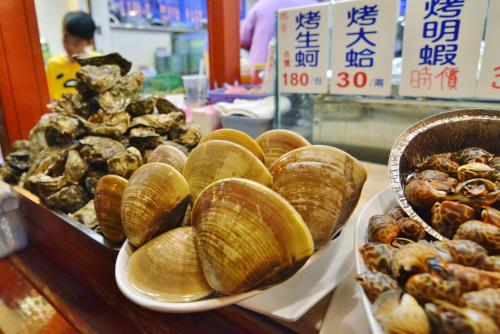 a display of pastries and other food in a store at Mulin B&B in Hengchun