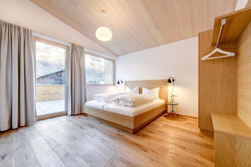 Postel nebo postele na pokoji v ubytování Hus 128