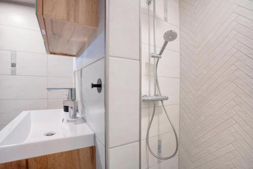 a bathroom with a shower and a sink at Fewo Gustav Melkert Str. 5A in Röbel