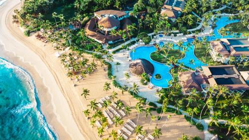 an aerial view of the beach at the excellence punta cana resort at Wyndham Alltra Punta Cana All Inclusive Resort in Punta Cana
