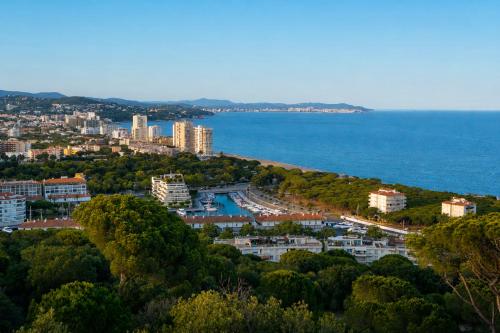 an aerial view of a city and the ocean at Kampaoh Platja d'Aro in Platja d'Aro