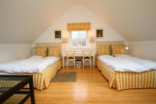 Postel nebo postele na pokoji v ubytování Sophiendal Manor