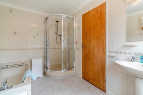 a bathroom with a shower and a sink at 4 Bed in Halesworth oc-willho in Halesworth