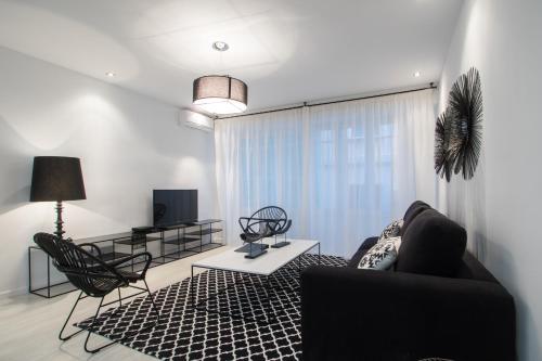TV o dispositivi per l'intrattenimento presso Valencia Luxury - Boutique Center