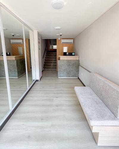 an empty hallway with stairs in a building at Hotel Centro in Cali