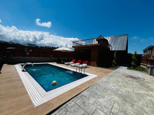 a swimming pool on top of a building at Bungavilla in Atakum