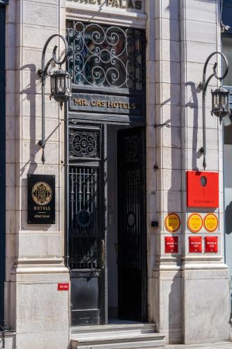 a building with a door with a sign on it at Mr Cas Hotels Taksim - Special Category in Istanbul