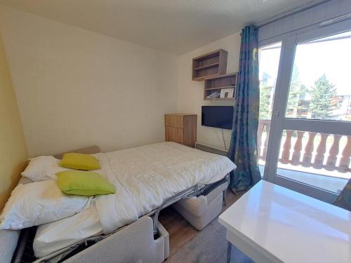 Studette aux Deux Alpes, pied des pistes