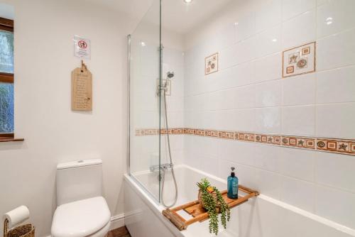 a bathroom with a shower and a toilet at 3 Bed in Blackburn oc-96386 in Blackburn