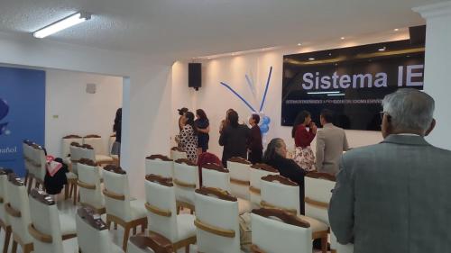 a group of people standing in a room at Casa Colon Quito Bed & Breakfast Hostel in Quito