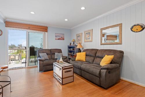 a living room with a couch and a chair at Carpinteria Shores CS 302 in Carpinteria