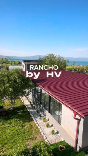 a building with a sign that reads raminato by iv at Rancho on Sevan beach by HV in Sevan