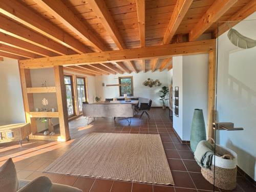 a living room with a piano in a house at Lake House Ternsche in Selm
