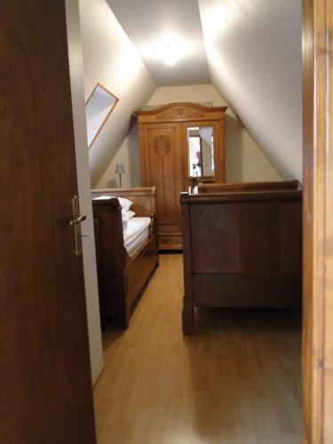 Ένα ή περισσότερα κρεβάτια σε δωμάτιο στο Le Loft a La couronne centre ville de Barr