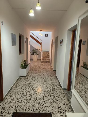 a hallway with a tile floor in a building at Casa Arico Viejo in Arico Viejo