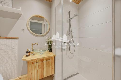 a bathroom with a shower and a sink at Sweet apartament in Haapsalu