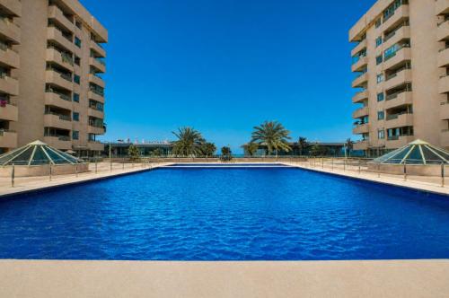 50 meters from the beach, with a pool and balcony