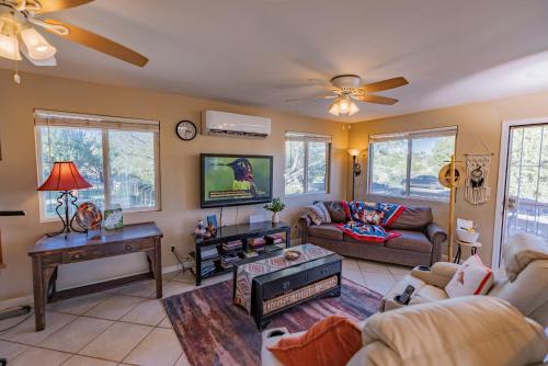 a living room with a couch and a table at Serenity at Rimrock in Rimrock