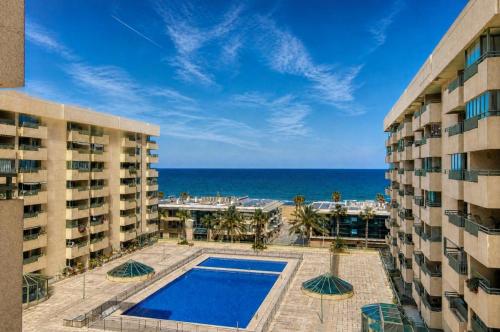 50 meters from the beach, with a pool and balcony