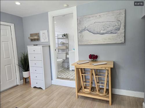 a dressing room with a desk and a mirror at Hideaway Steps off Atlantic Ave - Private Studio in Delray Beach