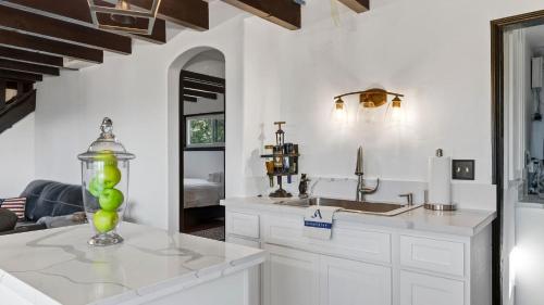 a kitchen with a counter with a sink and a sink at Emerald Overlook by AvantStay in Lake Arrowhead