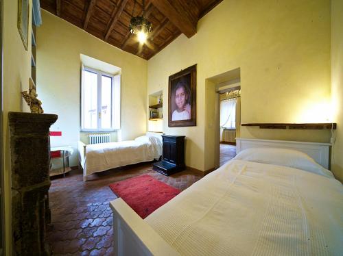 Voodi või voodid majutusasutuse Charming Trastevere Apartment toas