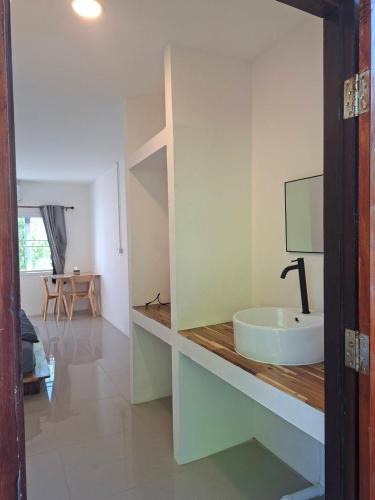 a bathroom with a sink on a counter at @888byChefKong in Ko Tao
