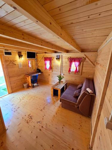 an overhead view of a living room in a log cabin at Rafting centar RT in Foča