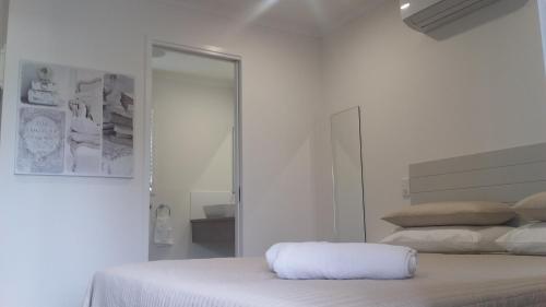 Postel nebo postele na pokoji v ubytování Verandah Motel