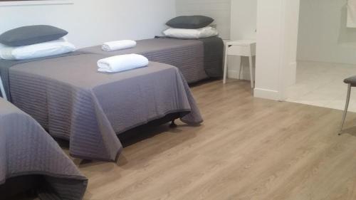 Postel nebo postele na pokoji v ubytování Verandah Motel