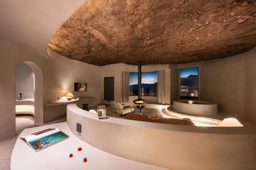 a hotel room with a bathtub in the middle at Enjoy nature Be energetic in Yunji