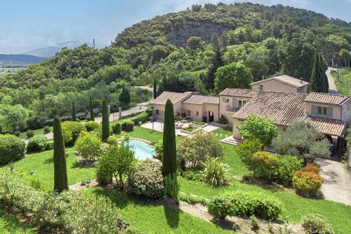 an aerial view of a villa with a garden at La Cascade des Souvenirs Vacation rental just a short walk from Vaison in Vaison-la-Romaine
