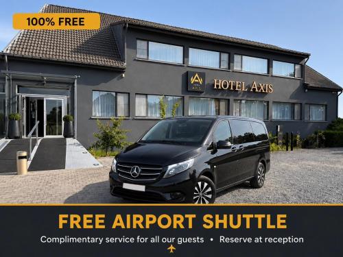 a black car parked in front of a building at Axis Hotel Brussels Airport in Kortenberg