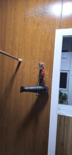 a bike on the side of a wooden wall at HALAL apartments in Tashkent city, Metro in Aktepa-Chigatay