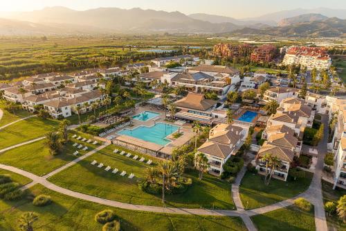 an aerial view of a resort with a pool and houses at Impressive Playa Granada Golf in Motril