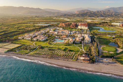 an aerial view of a resort on the beach at Impressive Playa Granada Golf in Motril