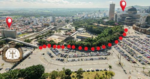 an aerial view of a parking lot with red balloons at Hotel Santo Afonso in Aparecida