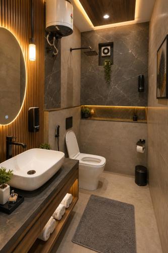 a bathroom with a sink and a toilet at Hotel Starlin Near Delhi Airport & Free Airport pickup in New Delhi
