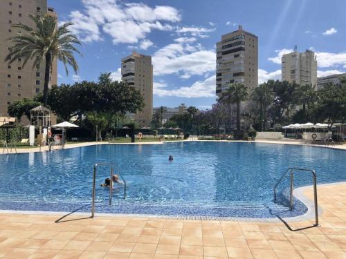 Exclusive beachfront apartment Torremolinos - pool - paddle - tenis - wifi - central aircon