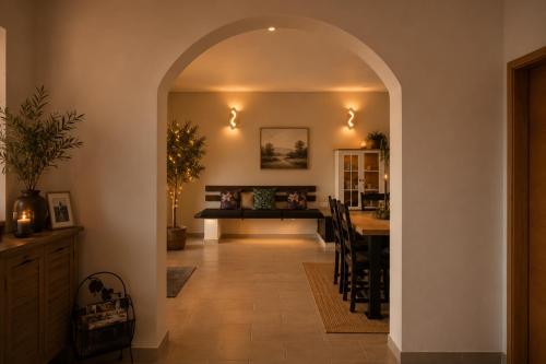 an archway leading to a kitchen and a dining room at Villa Vale in Labin