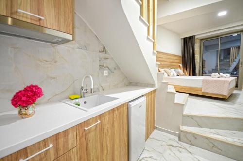 a kitchen with a sink and a counter at Faros Elafonisi in Elafonisi