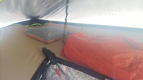 a close up of a bed in a tent at Tree Tent Bratislava in Prievoz