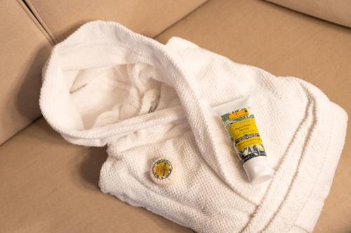 a white sweater with a tube of toothpaste at La Rocca di Camporgiano in Camporgiano