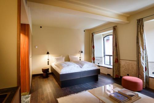 a hotel room with a bed and a window at Hotel Frihavnen in Copenhagen