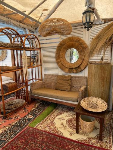 a living room with a couch and a bunk bed at Villa Tropical in Francavilla al Mare