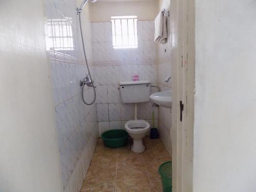 Koupelna v ubytování Manhattan Guesthouse Kampala