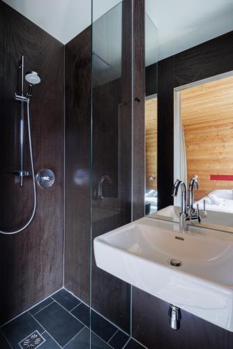 a bathroom with a sink and a shower at Aradira in Kappl