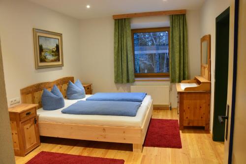 Un pat sau paturi într-o cameră la Nattererboden
