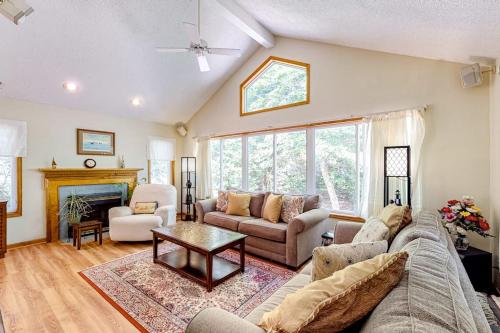 a living room with a couch and a table at Ocean Pines Fairway in Ocean Pines